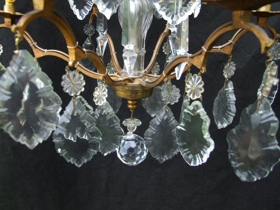 Circa 1900 A 5 arm Brass and Crystal Chandelier 